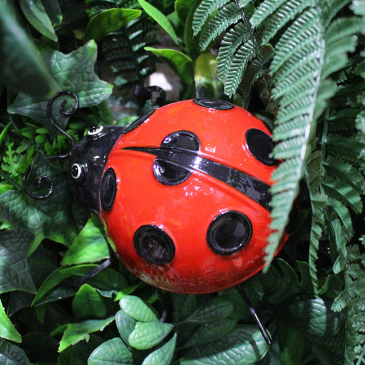 Décoration murale en métal coccinelle